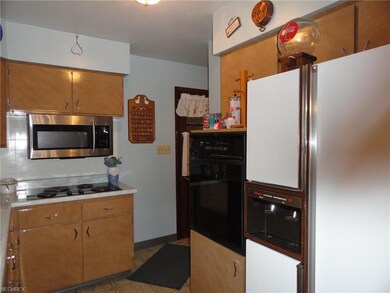 Kitchen opens to garage for easy access