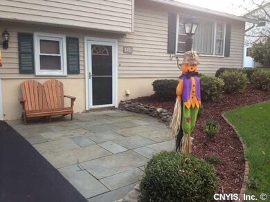 Exterior Front. New Front Flagstone Patio and Land