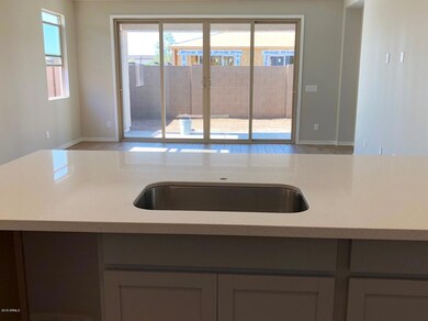 Open greatroom with 12' door
