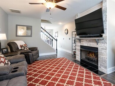The living room leads to the dining area and kitch
