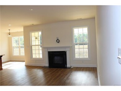 Actual house. Family room with fireplace.