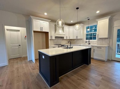 The photos shown are of a previously completed home with the same floor plan. These images are for layout reference only. Finishes, materials, colors, and features may vary and are not representative of the home currently under construction. This is 
