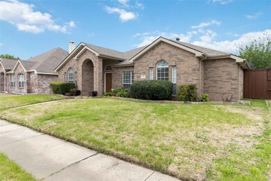 Ranch-style house featuring a front yard