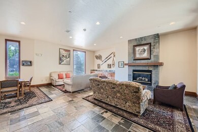 Lobby with gas fireplace, and serving bar