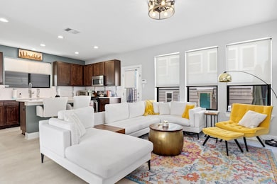 Living area featuring light wood finished floors 