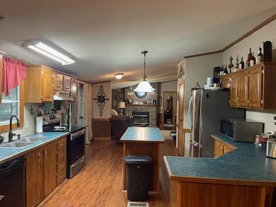 Kitchen featuring stainless steel appliances, orna