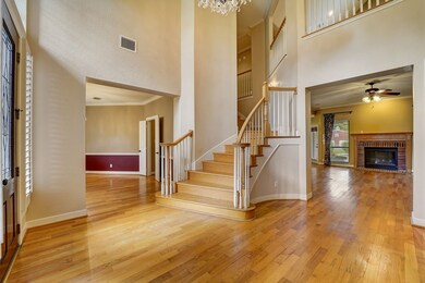 Upon entering, you are beckoned in by wood flooring