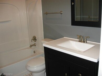Completely new bath. Ceramic tile floors and brushed steel fixtures and hardware.