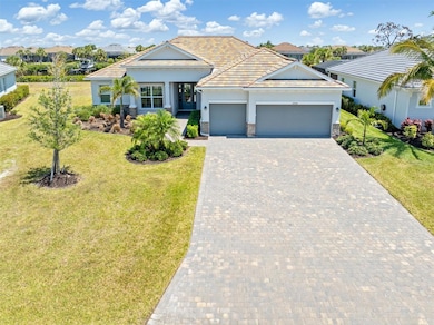 Tile roof, established landscaping complete the curb appeal.