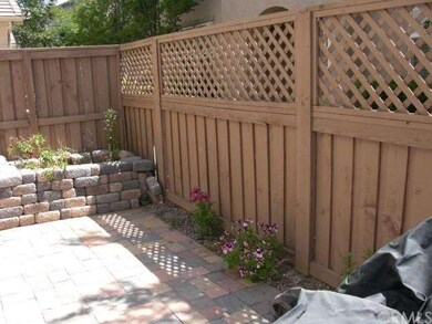 Private patio with interlocking pavers
