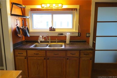 VIEW OF DOUBLE WINDOW OVER KITCHEN SINK...