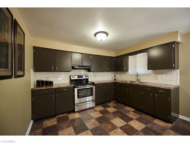 Remolded kitchen with stainless steel oven/range a
