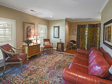 Opposite the dining room is the living room which 