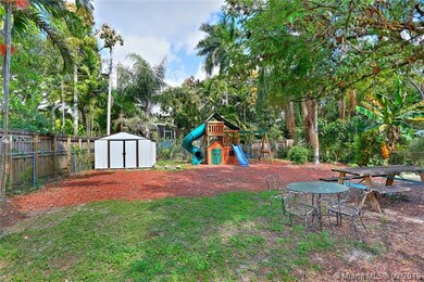 Large back yard with shed.