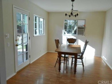 Large breakfast area off kitchen with access to ba
