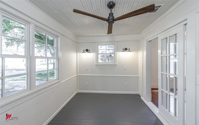 Spare room with dark hardwood / wood-style floorin