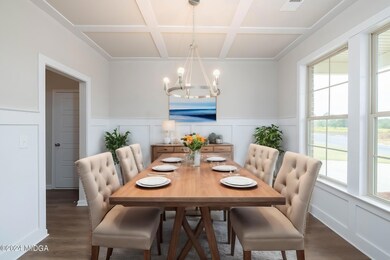 002 The formal dining room is located at