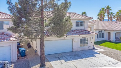 Mediterranean / spanish-style home featuring a til
