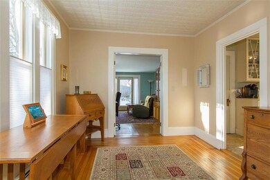 The dining room features a tin...