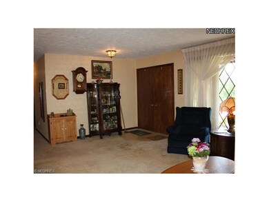 Nice size living room with a plenty of natural lig
