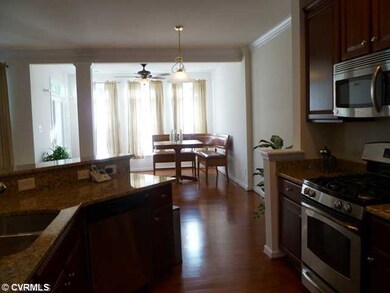 Other - A view of the dining area off the kitchen and the sunroom now used as a bistro.