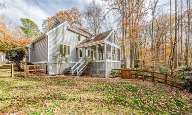 View of home's exterior with a sunroom
