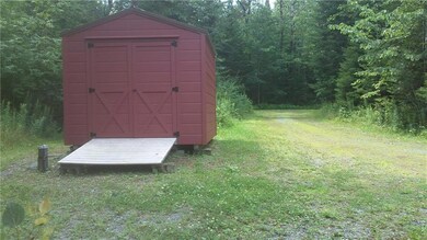 Storage shed with drive-way to the...