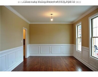 Exterior Front. Formal Dining Room, offers crown m