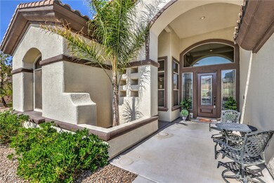Entrance to property featuring stucco siding