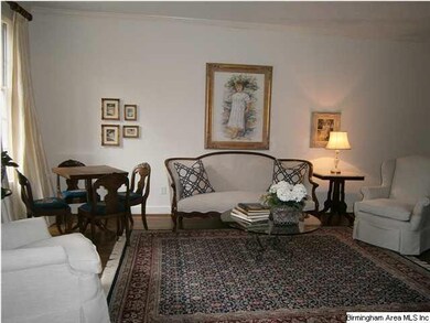 Living room.  Notice the hardwood floors on the ma