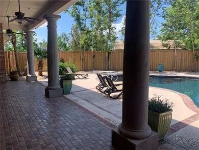 Back porch overlooking custom gunite pool
