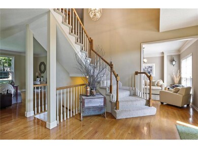 Stairway opens to foyer and to Kitchen
