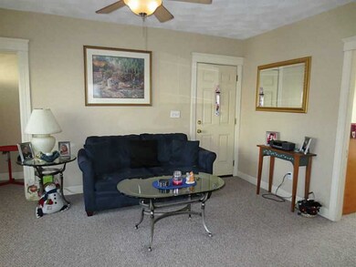 Living Room. Warm, carpeted LR with ceiling fan/li