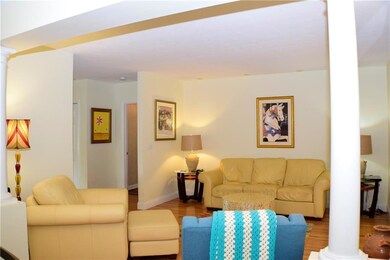 Open concept living area with wood...