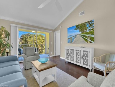 Living room with vaulted ceiling, ornamental moldi
