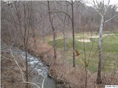 River and golf course in back