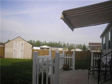 Patio/Deck Vinyl picket fence highlights the patio