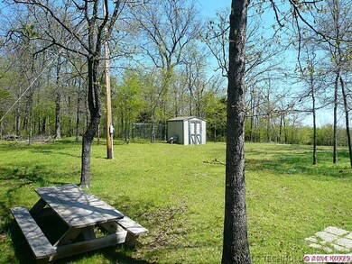 Yard with storage shed.