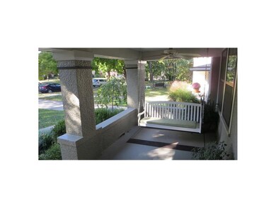 Large Porch with Two Sitting Areas and Two Ceiling