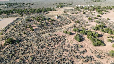 Aerial overview of property's location with a desert landscape and rural landscape