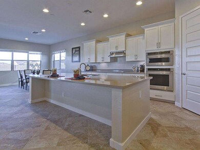 007_Staggered White Shaker Cabinets