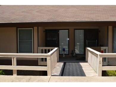 Exterior Front. Walkway . Door on the Left .