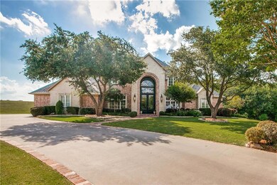 Located on a quiet cul-de-sac with side entry thre