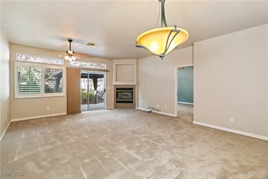 Alternate angle of the Living Room, fireplace, win