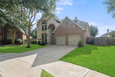 Lovely 2-story home with brick/stone elevation on