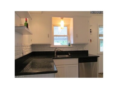 Updated Kitchen with Granite and Stainless Applian