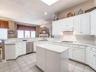 Kitchen open to breakfast and living area