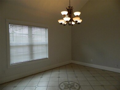 Neutral paint and flooring in living area.
