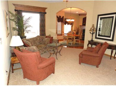 THE LIVING ROOM IS COZY AND A GREAT PLACE FOR CONV