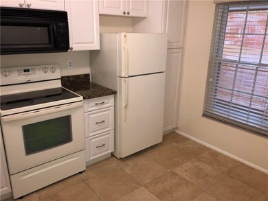 UPDATED EAT IN KITCHEN WITH TILED FLOORS, GRANITE 